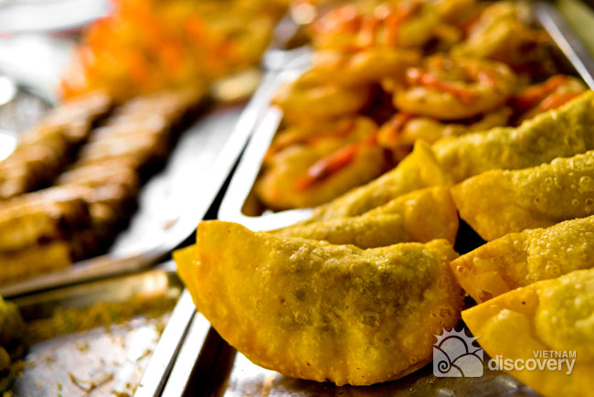Fried pillow-shaped cake - Hanoi street food tour