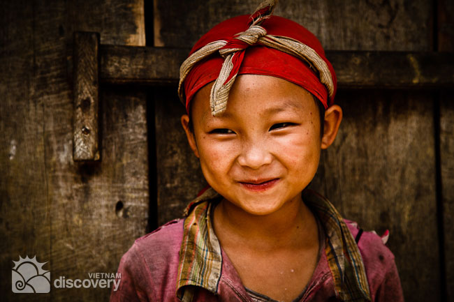 A Red Dzao child at Ta Phin Village in Sapa Vietnam - Sapa tour
