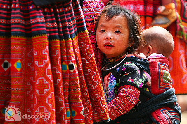 H'mong ethnic child in brocatelle costume - Vietnam ethnic groups