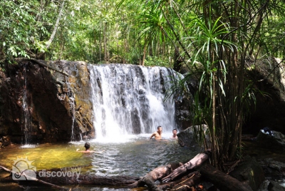 Relaxing at a picturesque waterfall at Phu Quoc National Park - Phu Quoc Tour