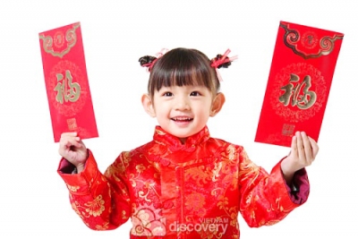 Children happy to receive Li Xi on Tet holidays in Vietnam
