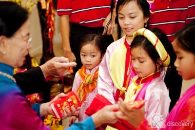 Children in queue to receive Li Xi on Tet Holidays in Vietnam