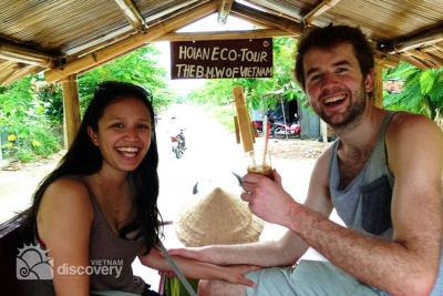 Tourists happy on the buffalo pulling cart - Hoi An half day tour
