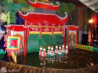 scene in water puppet play by artisan Phan Thanh Liem - Hanoi culture tour