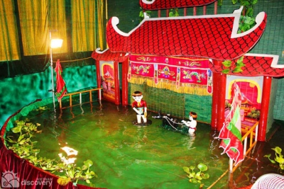 A scene in water puppet play - Hanoi city tour