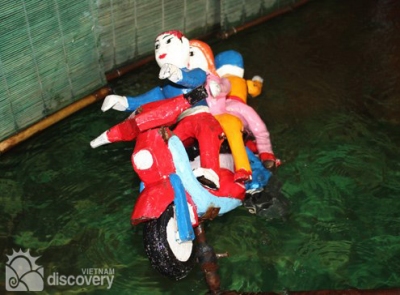 A water puppet play composed by artisan Liem - Hanoi tours